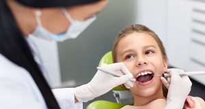 Painless Dental Treatment - Dentist near me: